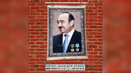 Əli Həsənov üzərində şəkli əks olunan xalça toxutdurdu