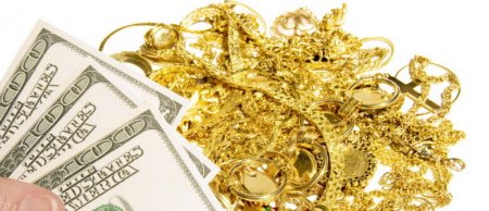 Ticarət savaşı: qızıl bahalaşır, dollar dəyər itirir Ticarət savaşı: qızıl bahalaşır, dollar dəyər itirir
